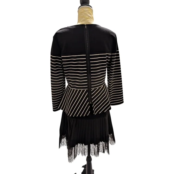 BCBGMaxAzria Black And White Peplum Top. Large. Exposed Back Zip. 3/4 Sleeve. - Picture 3 of 4